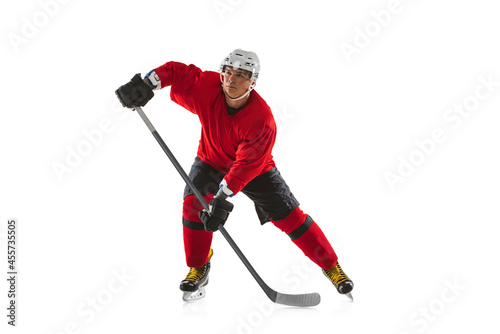 Photography Full-length image of professional male hockey player training isolated over whit
