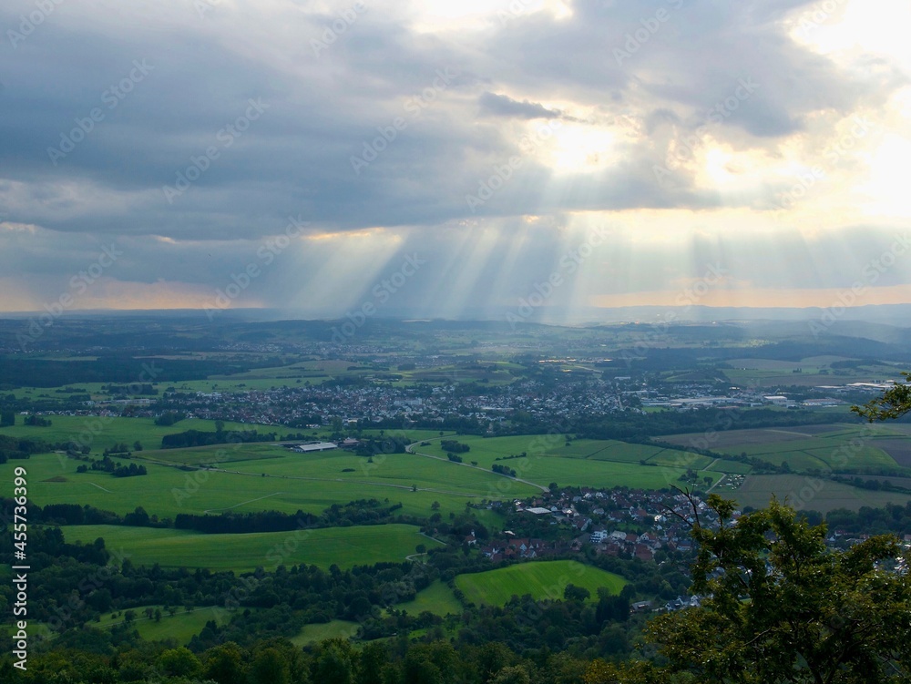 a view from the hill to the green valley on a cloudy day in the south of Germany