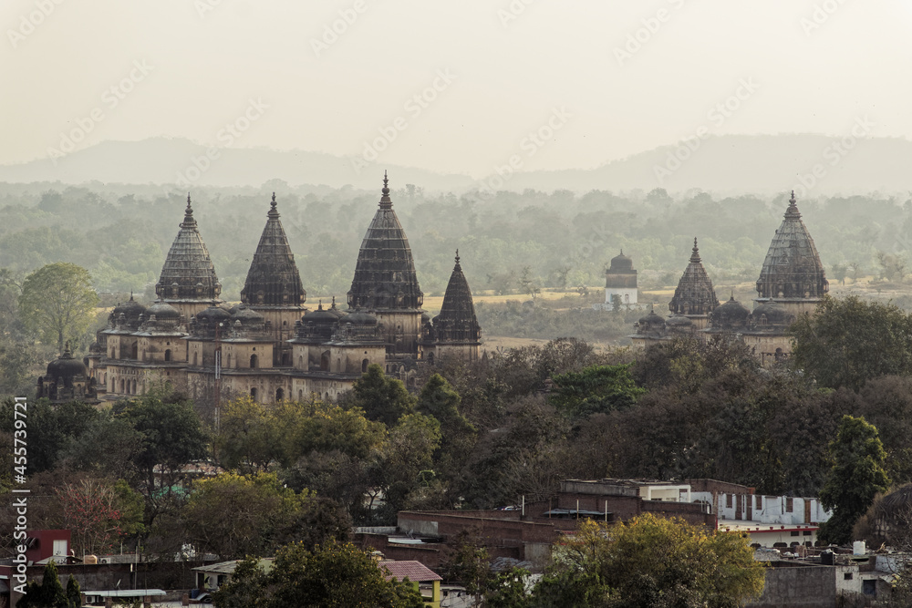 An aerial landscape view of the skyline of the ancient Hindu temples in the village of Orchha.