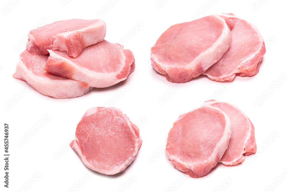 Raw pork pieces isolated on a white background.