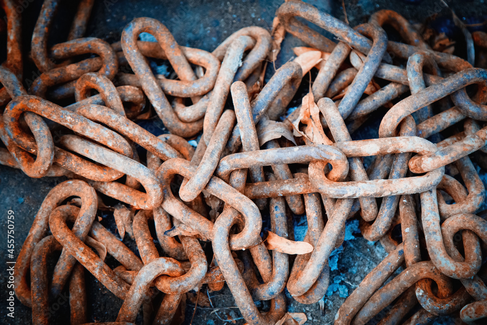 Broken and thrown off the chain of mental and psychological slavery. Freedom concept. Horizontal image. Broken and thrown off the chain of mental and psychological slavery. Freedom concept. Horizontal image.