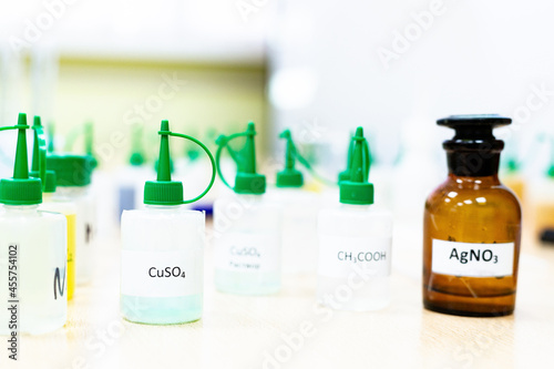 Chemical industry flask with liquid laboratory test tubes are on the table in the laboratory of liquid testing development of tests substances poisons additives stabilizers flavors cleaning the house