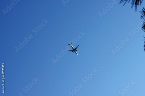 A plane in the blue sky. High quality photo