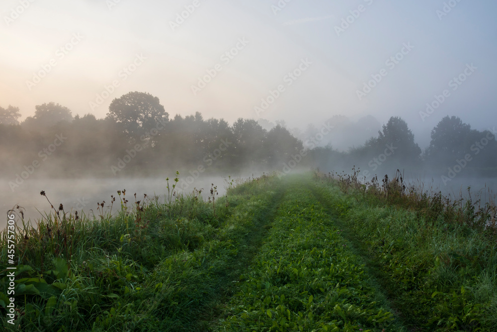 Mists over the ponds on Guldowy in Cieszyn against the background of the sky at dawn