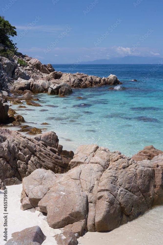 Rocky coast washed by azure sea Rocky coast washed by azure sea