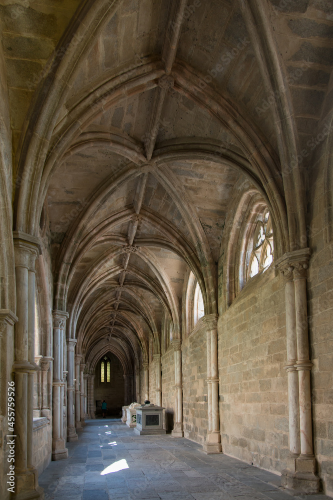 Gothic arches at Cloister of Evora Cathedral. No people. Portugal, Europe
