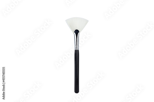 Fan brush for applying makeup isolated on white background