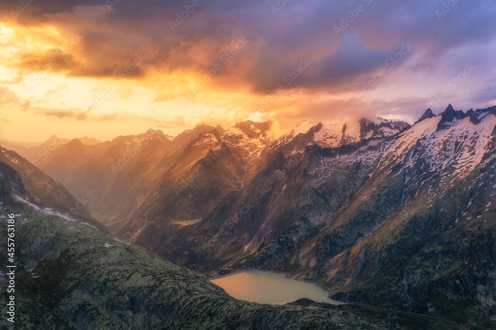 Burning sky and steep mountains in the alps. Burning sky and steep mountains in the alps.