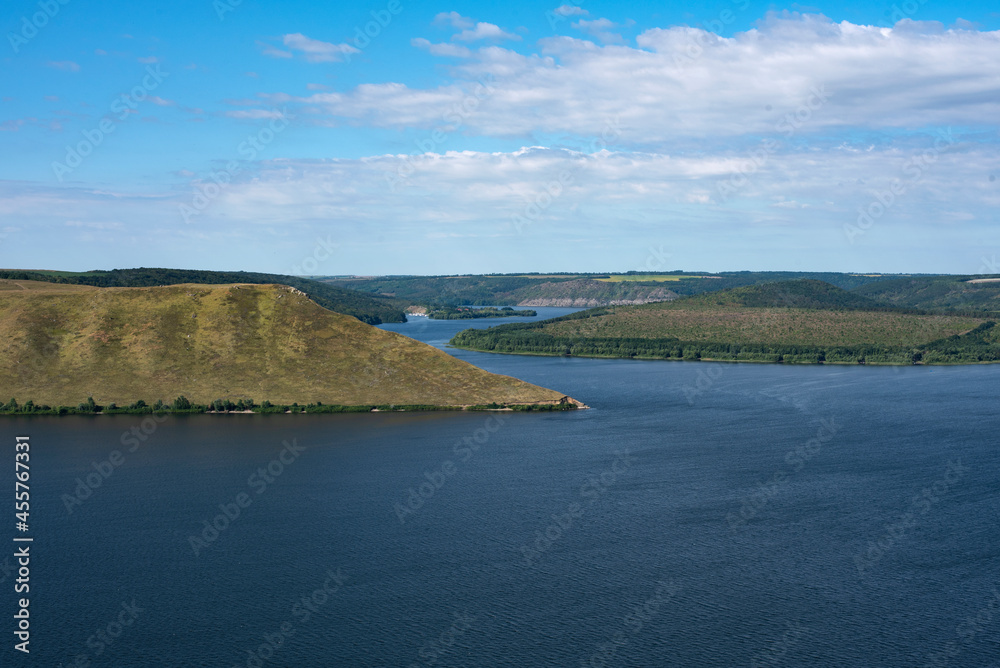 Landscape of beautiful River Dnipro with Rocky Mountains in Bakota, Ukraine. Summer Travel serene minimalistic view . 