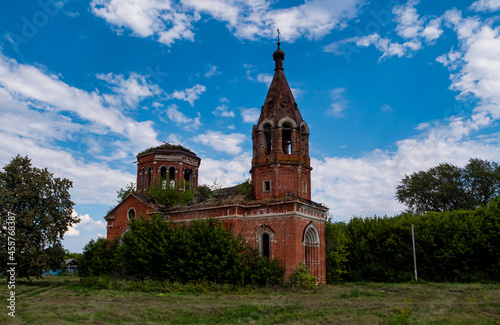 A church in the midst of dense grass. An abandoned church in Tatarstan, Russia. 