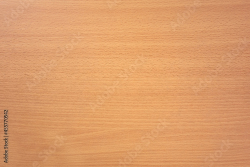 The texture of an orange wood countertop. Horizontal stripes.An empty space for the text.
