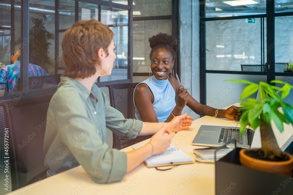 Colleagues In A Coworking Workplace. Colleagues In A Coworking Workplace.