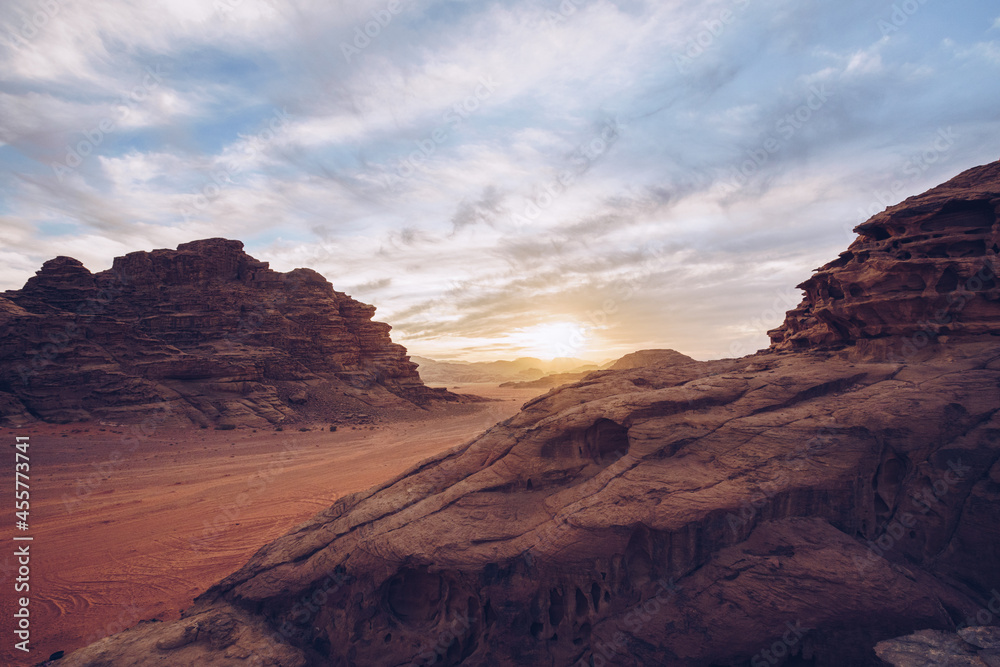 Picturesque view of high stone hills in desert and cloudy blue sky Picturesque view of high stone hills in desert and cloudy blue sky