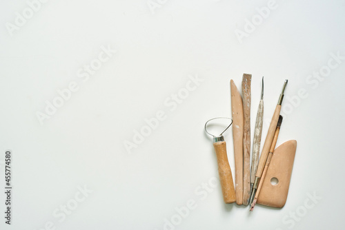 wooden tools for working with clay and ceramics, copy space