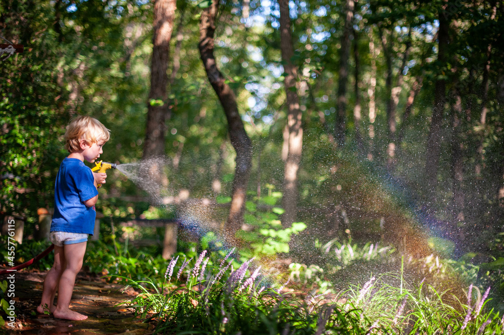 Spraying Rainbows from a Garden Hose Spraying Rainbows from a Garden Hose