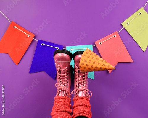 Pink Fashion Boots Against Party Wall photo