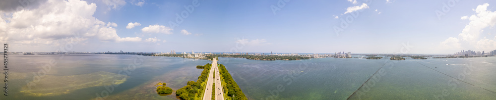 Aerial panoramic photo Julia Tuttle Causeway Bridge Miami Florida over Biscayne Bay