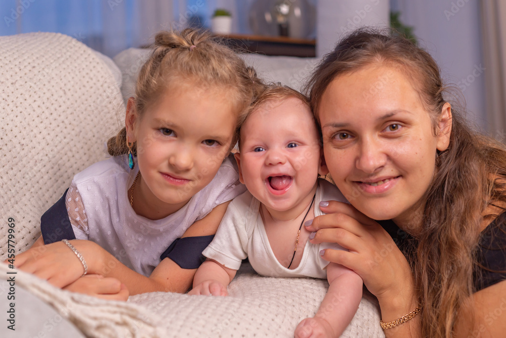 happy family together at home. mom and baby. family portrait happy family together at home. mom and baby. family portrait