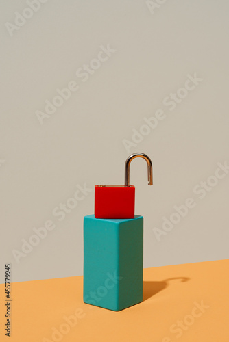 unlocked red padlock