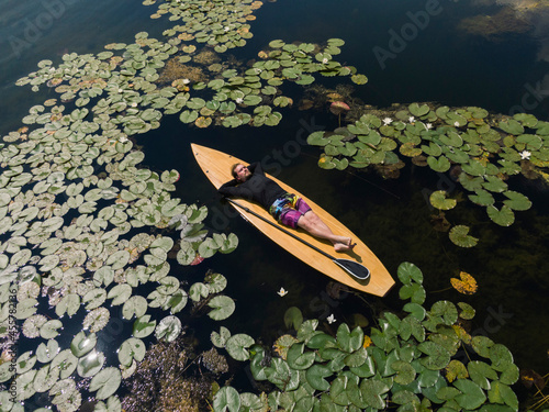 Paddle Boarding On A Lake photo