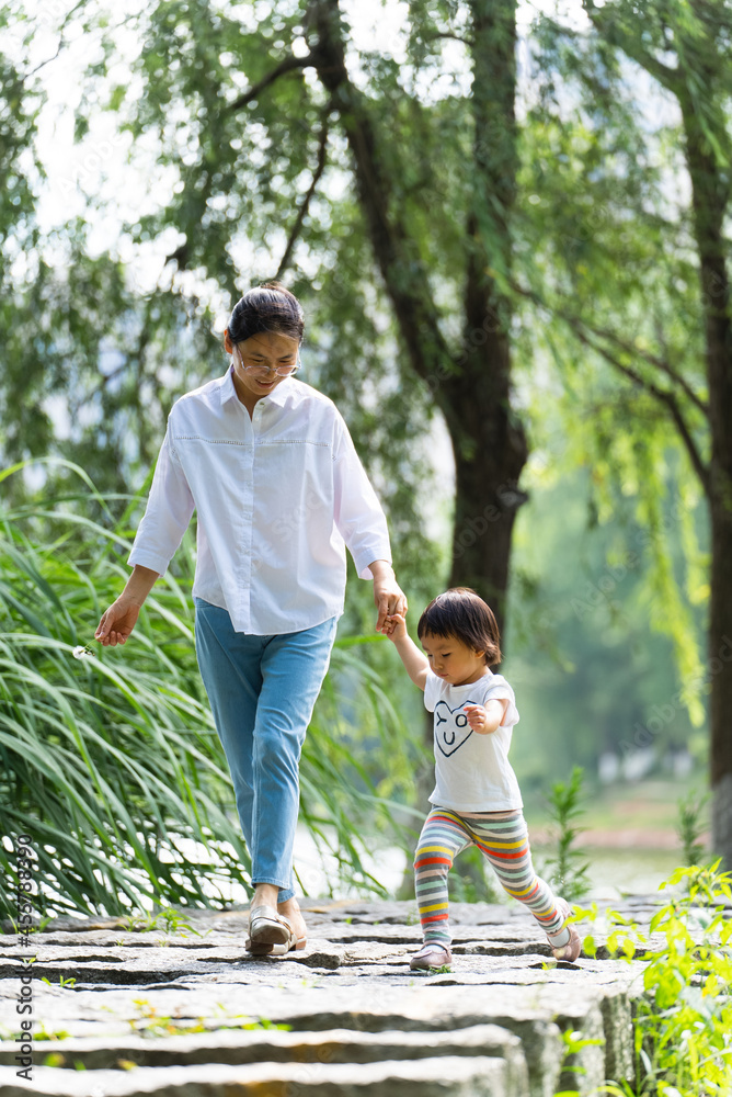 summer day kid in the park with mother summer day kid in the park with mother