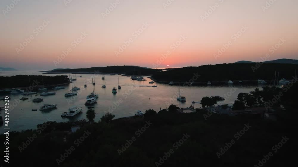 Sunset flying near water and sailboat. Croatia Hvar. Cinematic dron shot. Magic hour Sunset flying near water and sailboat. Croatia Hvar. Cinematic dron shot. Magic hour