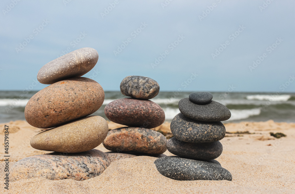 A pile of stones stacked on the beach A pile of stones stacked on the beach
