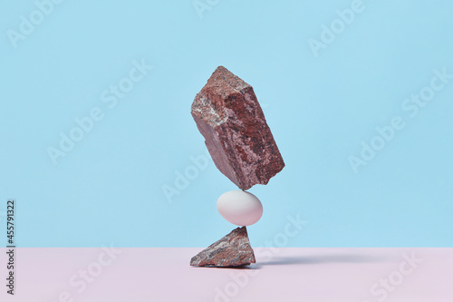 Egg between stones photo