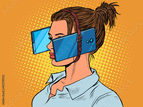Woman in virtual reality, smartphones. dependence on electronic gadgets photo
