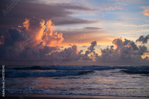 Sunrise storms florida on the beach photo