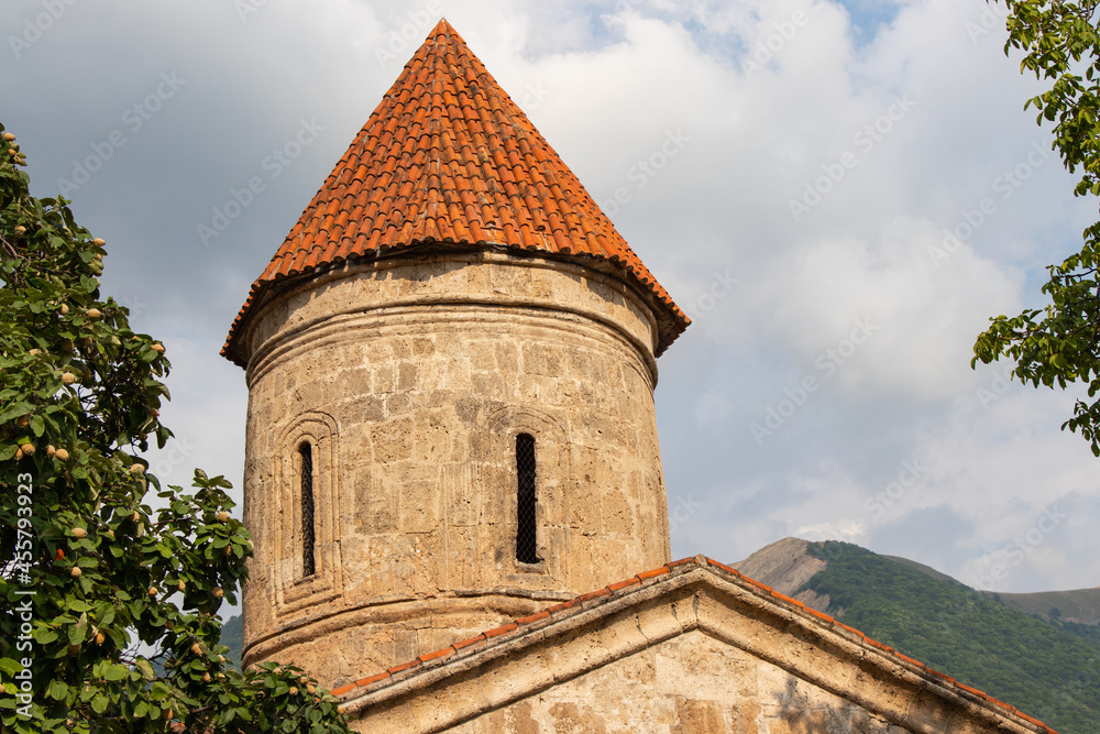 Fototapeta premium Ancient religious buildings in the Caucasus. Old christian temple in the Kish village of Sheki - Azerbaijan