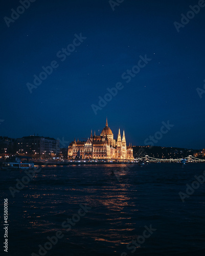 Photography beautiful view from the water on the educated parliament building in night Budap