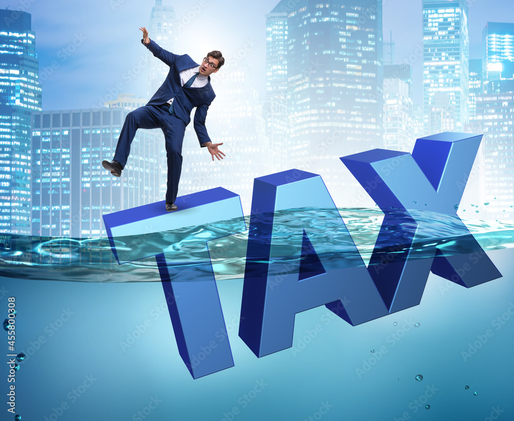 Businessman having problems with paying taxes Businessman having problems with paying taxes