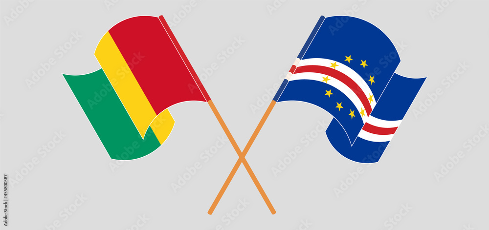 Crossed and waving flags of Guinea and Cape Verde Crossed and waving flags of Guinea and Cape Verde