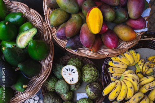 Baskets full of fresh exotic fruit in farmer's market