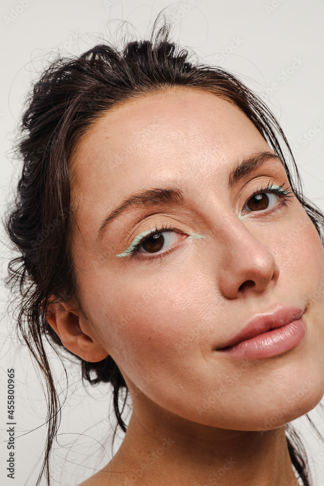 Young woman with green eyeliner makeup on smiling Young woman with green eyeliner makeup on smiling