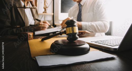 Canvas-taulu Business and lawyers discussing contract papers with brass scale on desk in office