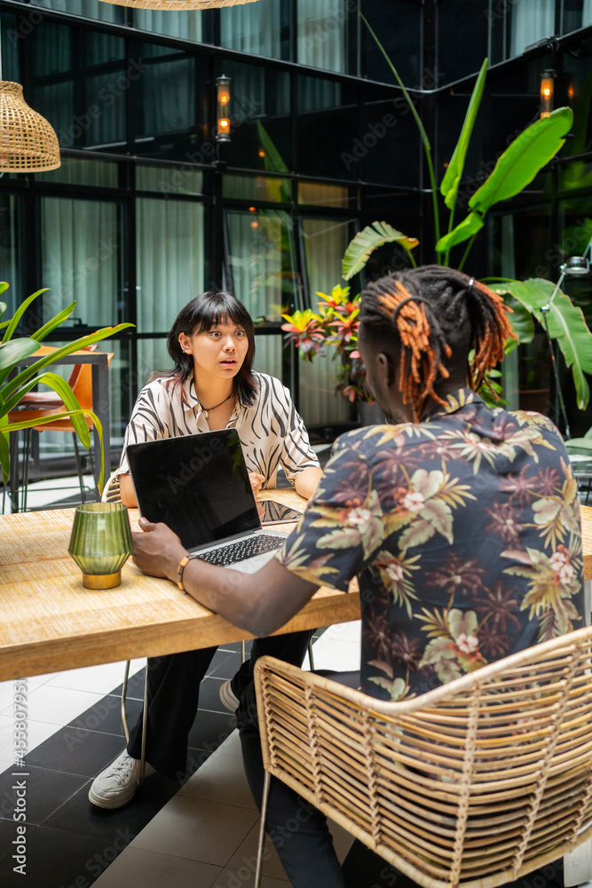 Colleagues Having An Interview In A Office Workplace. Colleagues Having An Interview In A Office Workplace.