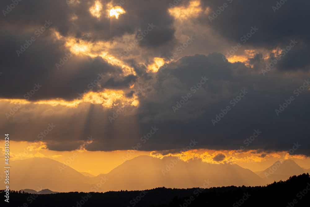 A sunset with the silhouette of the Pedraforca, a famous mountain in Catalonia.