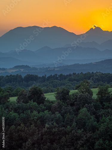 A sunset with the silhouette of the Pedraforca, a famous mountain in Catalonia. © Arnau