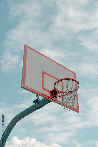 Basketball hoop and sky. 