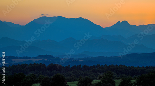 A sunset with the silhouette of the Pedraforca, a famous mountain in Catalonia.