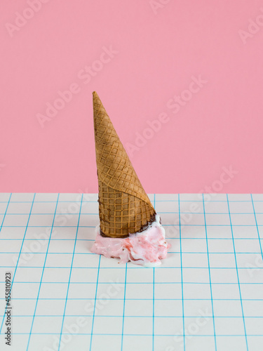 Colorful surrealist still life with melting ice cream photo