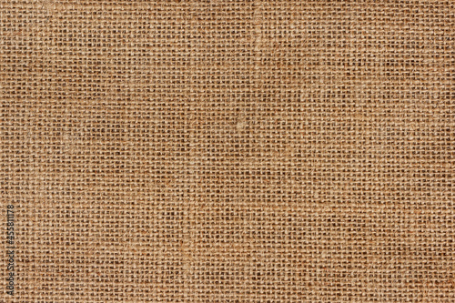 Natural linen raw uncolored close-up. Sack woven, sacking burlap texture