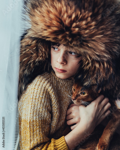 Portrait of a girl and a cat. photo