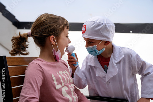 Little brothers playing doctor.