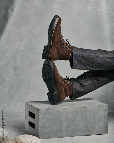 Mens boots on a gray background  photo