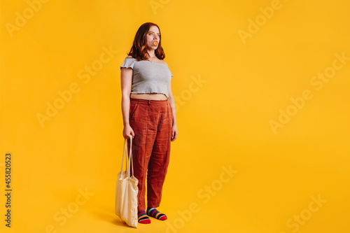 Woman holding a totebag  photo