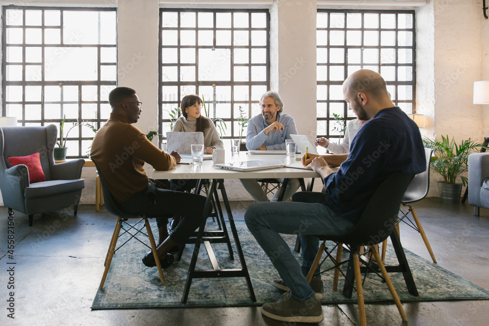 Businesspeople having a meeting in the office Businesspeople having a meeting in the office