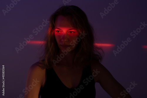 Female model with neon light on face